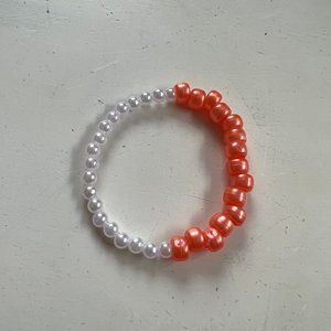 Metallic orange and pearl bead bracelet